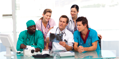 A group of healthcare trainees evaluating an x-ray result